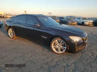 2011 BMW 7 Series 750i z VIN WBAKA8C57BCY36575, wystawiony jako Copart lot #77526024 z przebiegiem 120 087 mil mil oraz Czysty tytuł • Clean title. Historia ofert i sprzedaży dostępna na DreamBid. Obrazek 4.