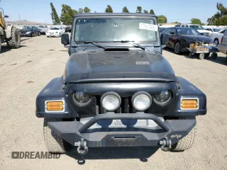 2004 Jeep Wrangler Sahara with VIN 1J4FA59SX4P718591, listed as a Copart auction lot 59907805 with 241,994 mi miles and Clean title. Bid and sale history available at DreamBid. Image 5.