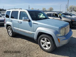 2012 Jeep Liberty Sport with VIN 1C4PJLAK7CW179474, listed as a Copart auction lot 54071285 with 130,312 mi miles and Salvage Title. Bid and sale history available at DreamBid. Image 4.