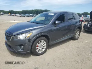 2014 Mazda CX-5 Sport with VIN JM3KE2BE7E0381939, listed as a Copart auction lot 62806195 with 262,699 mi miles and Clean title. Bid and sale history available at DreamBid. Image 1.