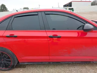 2020 Volkswagen Jetta SEL z VIN 3VWE57BU6LM086798, wystawiony jako IAAI lot #41603698 z przebiegiem 58 960 mil mil oraz . Historia ofert i sprzedaży dostępna na DreamBid. Obrazek 13.