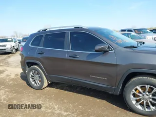 2019 Jeep Cherokee Latitude Plus with VIN 1C4PJMLBXKD162570, listed as a IAAI auction lot 41897313 with 142,110 mi miles. Bid and sale history available at carsss.com. Image 13.