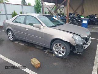 2006 Cadillac CTS with VIN 1G6DP577860143335, listed as a IAAI auction lot 42387624 with 97,858 mi miles and . Bid and sale history available at DreamBid. Image 1.
