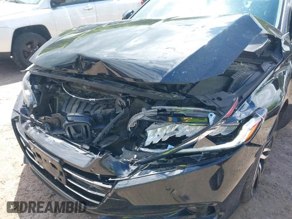 2021 Honda Accord Touring z VIN 1HGCV2F91MA022042, wystawiony jako IAAI lot #42301183 z przebiegiem 67 397 mil mil oraz . Historia ofert i sprzedaży dostępna na DreamBid. Obrazek 6.