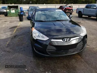 2012 Hyundai Veloster w/Red Int with VIN KMHTC6ADXCU063897, listed as a Copart auction lot 82100474 with 191,493 mi miles and Salvage title. Bid and sale history available at DreamBid. Image 14.