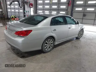 2012 Toyota Avalon with VIN 4T1BK3DB3CU440979, listed as a IAAI auction lot 41915347 with 131,046 mi miles. Bid and sale history available at carsss.com. Image 4.