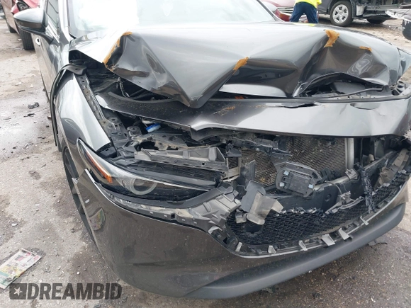 2021 Mazda 3 Premium z VIN JM1BPAML1M1318708, wystawiony jako IAAI lot #42178243 z przebiegiem 62 455 mil mil oraz . Historia ofert i sprzedaży dostępna na DreamBid. Obrazek 6.