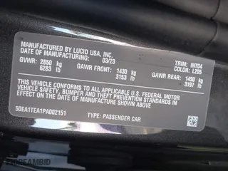2023 Lucid Air Touring with VIN 50EA1TEA1PA002151, listed as a IAAI auction lot 41219565 with 8,215 mi miles. Bid and sale history available at carsss.com. Image 9.