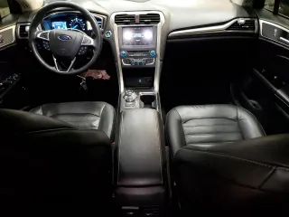 2017 Ford Fusion Hybrid SE z VIN 3FA6P0LU4HR226127, wystawiony jako Copart lot #50496455 z przebiegiem 98 027 mil mil oraz Szkoda całkowita • Salvage title. Historia ofert i sprzedaży dostępna na DreamBid. Obrazek 8.