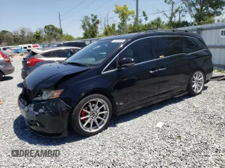 2014 Honda Odyssey Touring with VIN 5FNRL5H97EB016624, listed as a Copart auction lot 53444645 with 244,126 mi miles and Salvage Title. Bid and sale history available at DreamBid. Image 1.