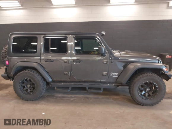 2018 Jeep Wrangler Unlimited Sport S с VIN 1C4HJXDG7JW280918, выставлен на аукционе IAAI как лот 41998831 с пробегом 66 539 миль миль и . История ставок и продаж доступна на DreamBid. Изображение 13.