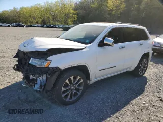 2017 Jeep Grand Cherokee Overland z VIN 1C4RJFCT7HC706695, wystawiony jako Copart lot #54316735 z przebiegiem 82 324 mil mil oraz Szkody całkowita. Historia ofert i sprzedaży dostępna na DreamBid. Obrazek 1.