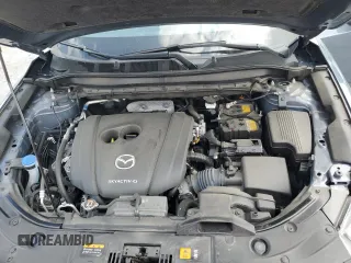 2023 Mazda CX-5 S Carbon Edition z VIN JM3KFBCM9P0158890, wystawiony jako Copart lot #53839045 z przebiegiem 26 623 mil mil oraz Szkody całkowita. Historia ofert i sprzedaży dostępna na DreamBid. Obrazek 12.