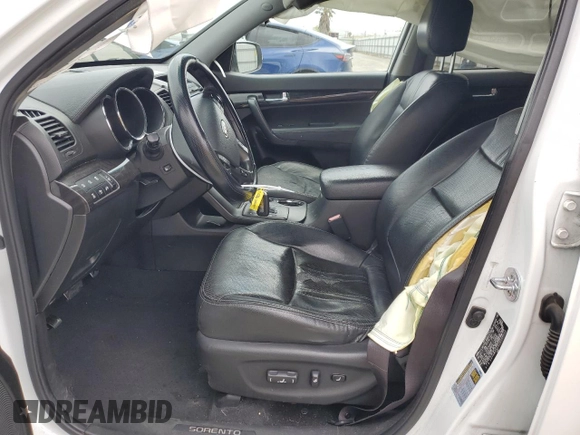2012 Kia Sorento SX z VIN 5XYKWDA25CG280219, wystawiony jako Copart lot #54397025 z przebiegiem 197 685 mil mil oraz Szkoda całkowita • Salvage title. Historia ofert i sprzedaży dostępna na DreamBid. Obrazek 7.