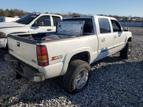 2005 GMC Sierra 1500 SLT z VIN 2GTEK13T451173124, wystawiony jako Copart lot #85948624 z przebiegiem Nie podano mil oraz Szkoda całkowita • Salvage title. Historia ofert i sprzedaży dostępna na DreamBid. Obrazek 4.