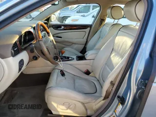 2005 Jaguar XJ VDP with VIN SAJWA82C65SG45247, listed as a Copart auction lot 77950594 with 0 mi miles and Salvage Title. Bid and sale history available at carsss.com. Image 7.