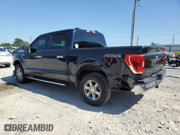 2021 Ford F-150 XL with VIN 1FTFW1E5XMFA47980, listed as a Copart auction lot 56737215 with 63,781 mi miles and Salvage title. Bid and sale history available at DreamBid. Image 2.