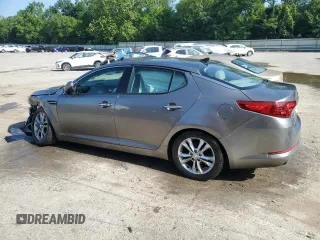 2013 Kia Optima EX z VIN 5XXGN4A73DG228548, wystawiony jako Copart lot #62209395 z przebiegiem 142 692 mil mil oraz Szkoda całkowita • Salvage title. Historia ofert i sprzedaży dostępna na DreamBid. Obrazek 2.