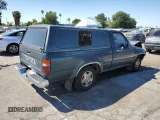 1994 Toyota Pickup DLX z VIN 4TARN81P2RZ175695, wystawiony jako Copart lot #50415385 z przebiegiem 258 048 mil mil oraz Szkoda całkowita • Salvage title. Historia ofert i sprzedaży dostępna na DreamBid. Obrazek 3.