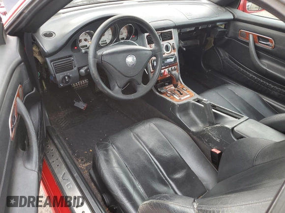 2003 Mercedes-Benz SLK 320 z VIN WDBKK65F93F271366, wystawiony jako Copart lot #81280154 z przebiegiem 186 333 mil mil oraz Szkoda całkowita • Salvage title. Historia ofert i sprzedaży dostępna na DreamBid. Obrazek 8.