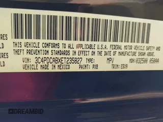 2014 Dodge Journey SE with VIN 3C4PDCABXET235827, listed as a IAAI auction lot 41927966 with 186,179 mi miles and . Bid and sale history available at carsss.com. Image 9.