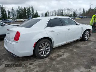 2016 Chrysler 300 Anniversary Edition with VIN 2C3CCARG1GH270827, listed as a IAAI auction lot 41765997 with 122,288 mi miles and . Bid and sale history available at DreamBid. Image 4.