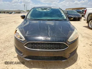 2016 Ford Focus SE with VIN 1FADP3F23GL271205, listed as a Copart auction lot 59395855 with 202,504 mi miles and Salvage title. Bid and sale history available at DreamBid. Image 5.
