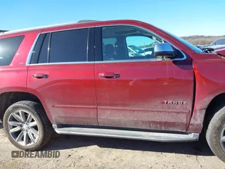 2016 Chevrolet Tahoe LTZ z VIN 1GNSKCKC9GR205745, wystawiony jako IAAI lot #41710241 z przebiegiem 94 931 mil mil oraz . Historia ofert i sprzedaży dostępna na DreamBid. Obrazek 13.