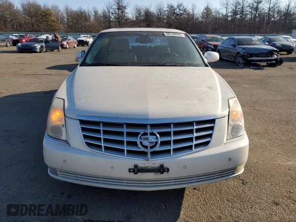 2007 Cadillac DTS V8 z VIN 1G6KD57Y27U208554, wystawiony jako Copart lot #88748645 z przebiegiem 80 341 mil mil oraz Tytuł czysty. Historia ofert i sprzedaży dostępna na DreamBid. Obrazek 5.