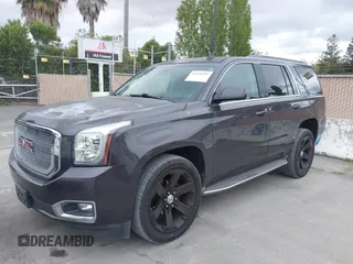 2015 GMC Yukon SLT with VIN 1GKS1BKC6FR245564, listed as a IAAI auction lot 42139295 with 149,088 mi miles. Bid and sale history available at carsss.com. Image 6.