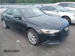 2014 Audi A6 Premium Plus z VIN WAUFGAFC0EN055147, wystawiony jako IAAI lot #42521453 z przebiegiem 206 922 mil mil oraz . Historia ofert i sprzedaży dostępna na DreamBid. Obrazek 1.