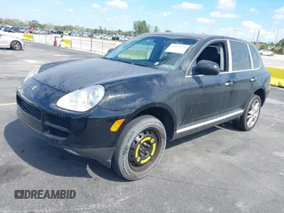 2004 Porsche Cayenne S with VIN WP1AB29P44LA75006, listed as a IAAI auction lot 41516951 with 119,828 mi miles. Bid and sale history available at carsss.com. Image 2.
