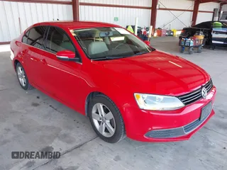 2013 Volkswagen Jetta TDI w/Premium with VIN 3VW3L7AJ2DM246343, listed as a IAAI auction lot 42157433 with 140,955 mi miles and . Bid and sale history available at DreamBid. Image 1.