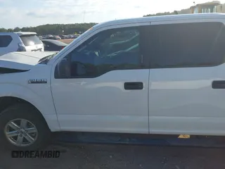 2018 Ford F-150 XL with VIN 1FTEW1E55JKF29898, listed as a IAAI auction lot 40593129 with 158,663 mi miles and . Bid and sale history available at carsss.com. Image 14.