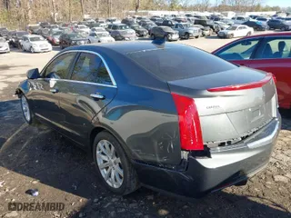 2018 Cadillac ATS Sedan RWD with VIN 1G6AA5RX8J0104318, listed as a IAAI auction lot 41624747 with 73,836 mi miles. Bid and sale history available at carsss.com. Image 3.