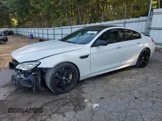 2016 BMW M6 z VIN WBS6E9C51GG437202, wystawiony jako Copart lot #71389434 z przebiegiem 80 673 mil mil oraz Szkody całkowita. Historia ofert i sprzedaży dostępna na DreamBid. Obrazek 1.