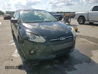 2012 Ford Focus SE z VIN 1FAHP3K28CL420113, wystawiony jako Copart lot #56986925 z przebiegiem 87 381 mil mil oraz Szkoda całkowita • Salvage title. Historia ofert i sprzedaży dostępna na DreamBid. Obrazek 13.