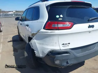 2016 Jeep Cherokee Sport with VIN 1C4PJMAB1GW314251, listed as a IAAI auction lot 41815330 with 124,588 mi miles. Bid and sale history available at carsss.com. Image 18.