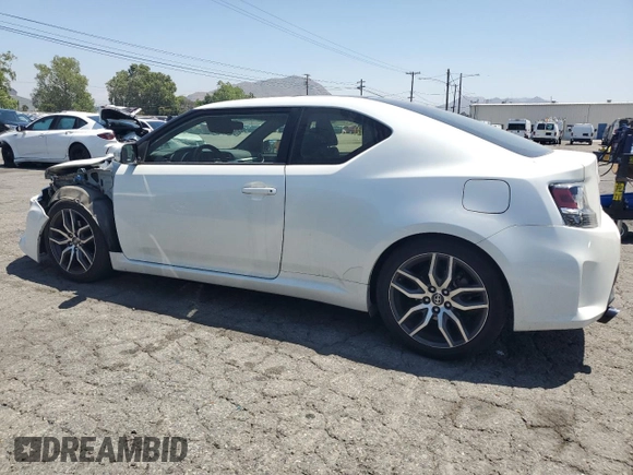 2015 Scion tC with VIN JTKJF5C7XFJ013441, listed as a Copart auction lot 54880385 with 47,540 mi miles and Salvage Title. Bid and sale history available at carsss.com. Image 2.