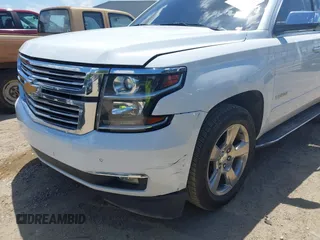 2020 Chevrolet Tahoe LTZ with VIN 1GNSCCKCXLR215899, listed as a IAAI auction lot 40128171 with 109,541 mi miles and . Bid and sale history available at DreamBid. Image 6.