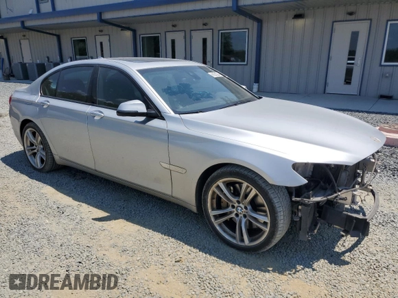 2013 BMW 7 Series 750i with VIN WBAYA8C58DC996865, listed as a Copart auction lot 61831294 with 151,238 mi miles and Salvage Title. Bid and sale history available at DreamBid. Image 4.