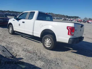 2015 Ford F-150 XL with VIN 1FTEX1C86FFB98582, listed as a IAAI auction lot 41678059 with 76,424 mi miles. Bid and sale history available at carsss.com. Image 3.