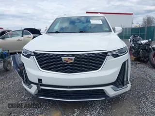 2020 Cadillac XT6 FWD Premium Luxury z VIN 1GYKPCRSXLZ137290, wystawiony jako IAAI lot #41814228 z przebiegiem 61 661 mil mil oraz . Historia ofert i sprzedaży dostępna na DreamBid. Obrazek 13.