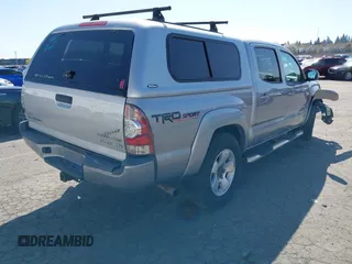 2014 Toyota Tacoma with VIN 3TMLU4EN7EM146705, listed as a IAAI auction lot 41949827 with 147,887 mi miles and . Bid and sale history available at DreamBid. Image 4.