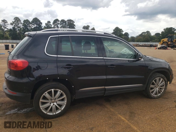 2014 Volkswagen Tiguan SEL with VIN WVGAV3AX5EW558929, listed as a Copart auction lot 71004684 with 125,628 mi miles and Clean title. Bid and sale history available at DreamBid. Image 3.