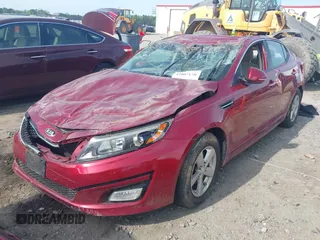 2015 Kia Optima LX z VIN 5XXGM4A75FG503066, wystawiony jako IAAI lot #42007170 z przebiegiem 128 918 mil mil oraz . Historia ofert i sprzedaży dostępna na DreamBid. Obrazek 2.