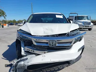 2020 Honda Pilot EX-L with VIN 5FNYF5H50LB020477, listed as a IAAI auction lot 40950652 with 1 mi miles. Bid and sale history available at carsss.com. Image 12.