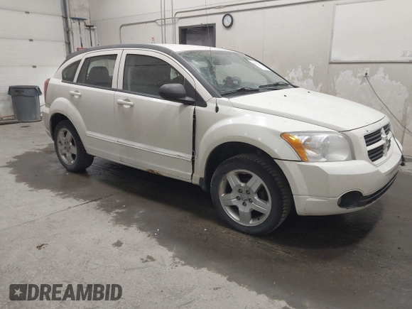 2009 Dodge Caliber SXT with VIN 1B3HB48A19D212690, listed as a IAAI auction lot 42076527 with 212,909 mi miles and . Bid and sale history available at carsss.com. Image 1.