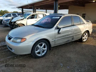 2001 Mazda Protege LX with VIN JM1BJ225310467019, listed as a Copart auction lot 80049274 with 202,091 mi miles and Salvage Title. Bid and sale history available at carsss.com. Image 1.