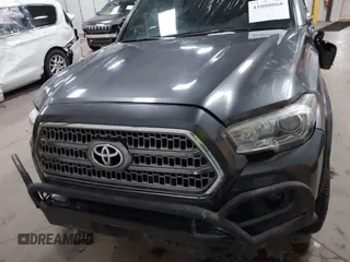 2016 Toyota Tacoma SR5 with VIN 3TMDZ5BNXGM009423, listed as a IAAI auction lot 41008068 with 107,426 mi miles and . Bid and sale history available at DreamBid. Image 12.